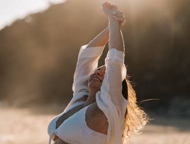 Boiçucanga de Ensaio gestante no por do sol