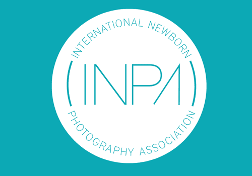 INPA - International Newborn Photography Association.