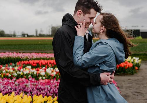 Proposals of A Rainy Day Proposal at Amsterdam Tulip Experience: Capturing Love in Every Weather