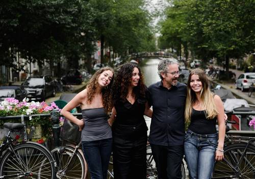 Vacation Photography of Capturing Family Milestones in Amsterdam’s Jordaan District: Anniversary and Graduation Photo Session