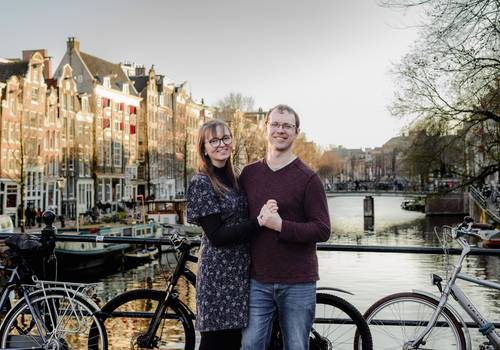Vacation Photography of A Romantic Dance Through Amsterdam's Canal Belt: Anniversary Photo Session