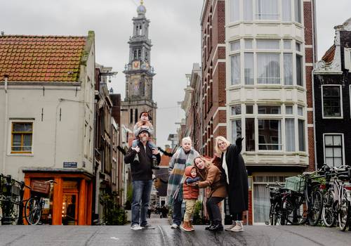 Vacation Photography of Why a Family Photoshoot in Amsterdam is a Must: A Candid Winter Session Along the Canals