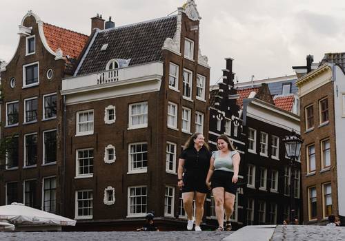 Vacation Photography of A First European Trip, A Houseboat Stay, And A Love Story Told in Amsterdam