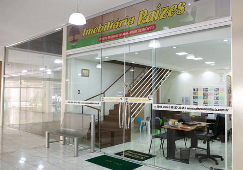 Ambientes de Imobiliária Raízes