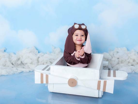 Mini sessão baby de Melinda em ensaio aviadora
