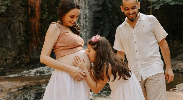 Gestante de Débora e família