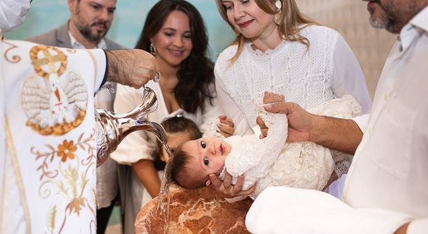 Sorrisos de criança de O Batizado da Lisa