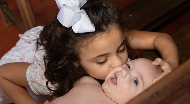 Infantil e Família de Batizado do Antônio