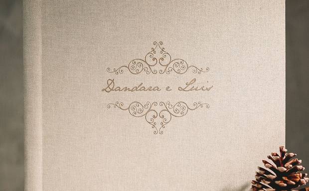 Como devo guardar meu álbum de fotografia?