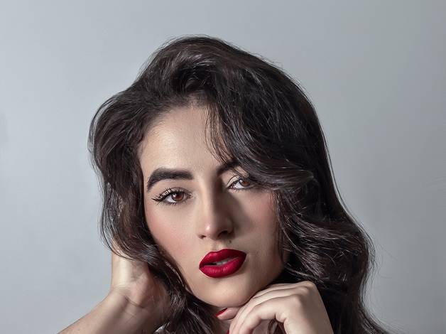 FEMININO de EVELYN REGINA