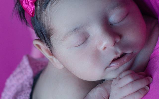 Como funciona a fotografia newborn