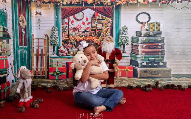 Ensaio de Natal da Ana Luisa no cenário 3D