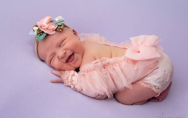 What is the best time to take newborn photos?