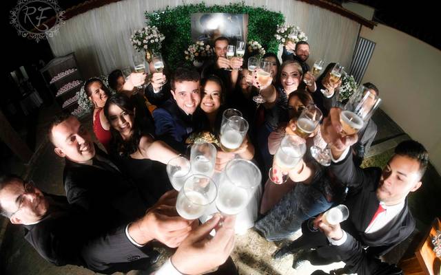 Equipe de profissionais no casamento de Lara e Miguel