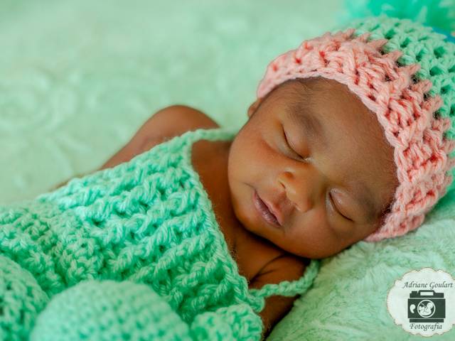 Newborn de Taylor, um príncipe cor de ébano. O ébano simboliza nobreza e, principalmente, resistência.