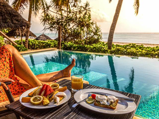 Hoteis na praia  de Sunshine Hotel em Zanzibar. 