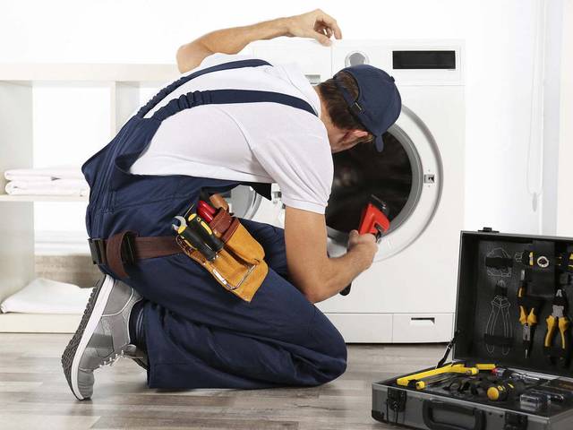 WASHING MACHINE REPAIR of How Washing Machine Repair in Dubai Fix a Washer That Won’t Drain Properly