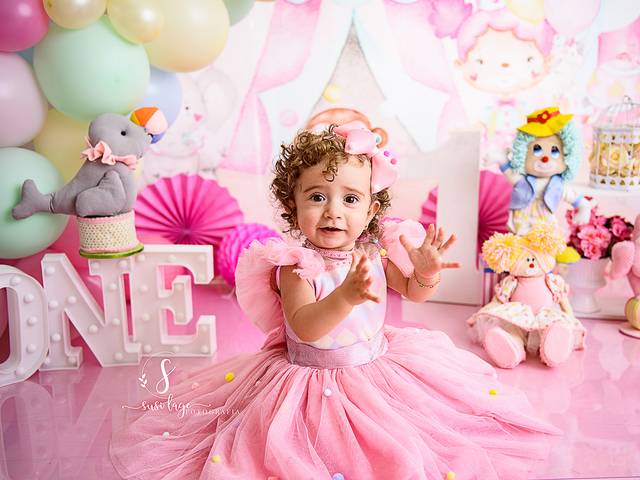 Acompanhamento do Bebê de Ensaio Circo Rosa