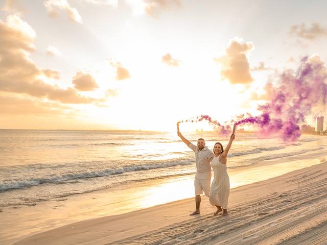 Gestante de Revelação em praia de Maceió com fotografias