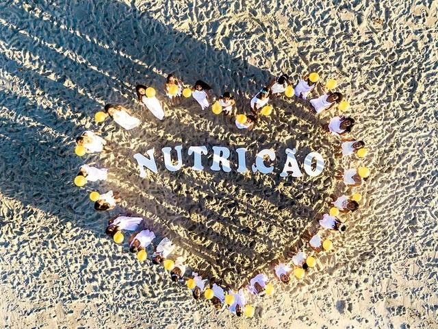 FORMATURA de Turma de Nutrição Fotos na praia
