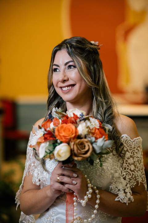 fotografo-em-osorio-litoral-norte-rio-grande-do-sul-felipe-lopes-fotografia-cerimonia-noturna-de-casamento-na-igreja-catolica-fotos-na-chuva-noivos'
