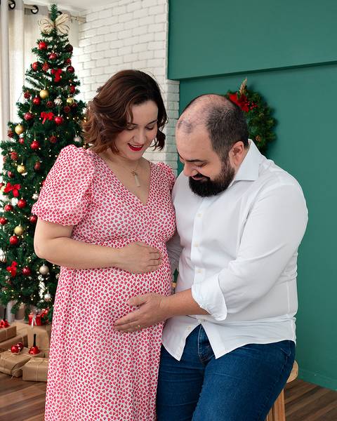 Ensaio de Natal anunciando gravidez.'