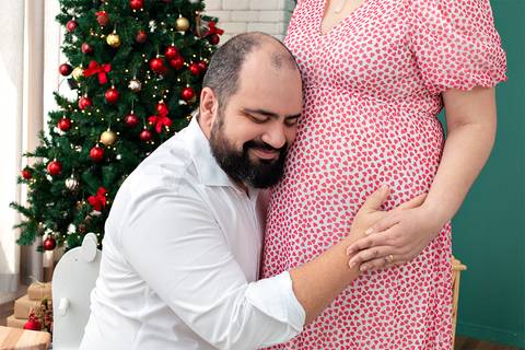 Ensaio de Natal anunciando gravidez.'