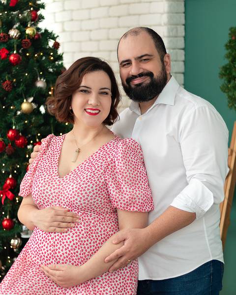 Ensaio de Natal anunciando gravidez.'