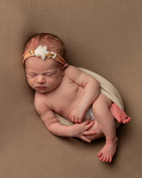 Bebê recém-nascida em ensaio Newborn'