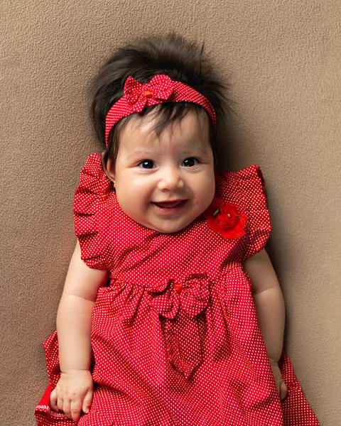 Bebê em ensaio de acompanhamento mensal'