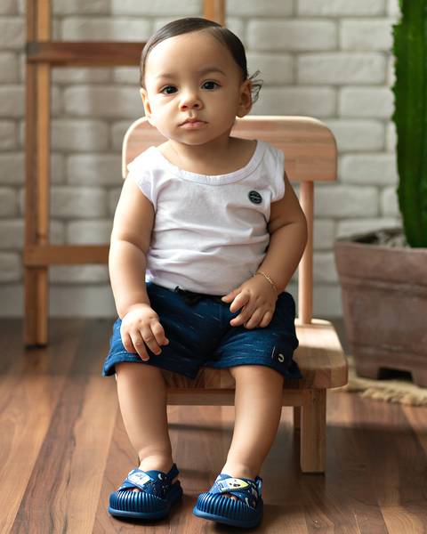 bebê em ensaio de acompanhamento mensal aos 7 meses'