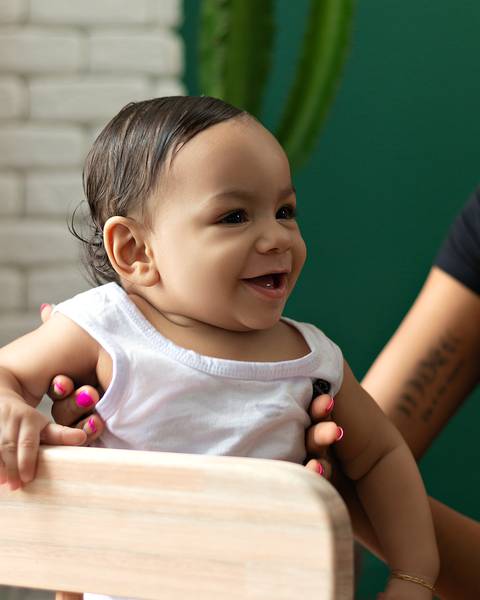 bebê em ensaio de acompanhamento mensal aos 7 meses'