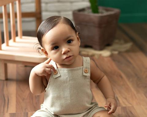 bebê em ensaio de acompanhamento mensal aos 7 meses'