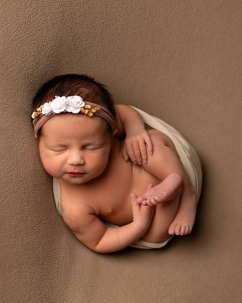 Bebê dormindo em seu ensaio Newborn feito na Amoradia em Natal/RN'