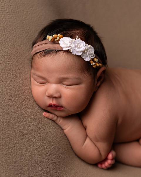 Bebê dormindo em ensaio newborn'