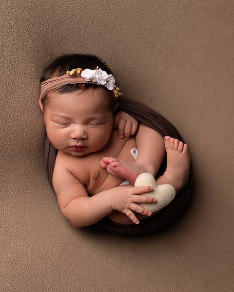 Bebê dormindo em ensaio newborn'