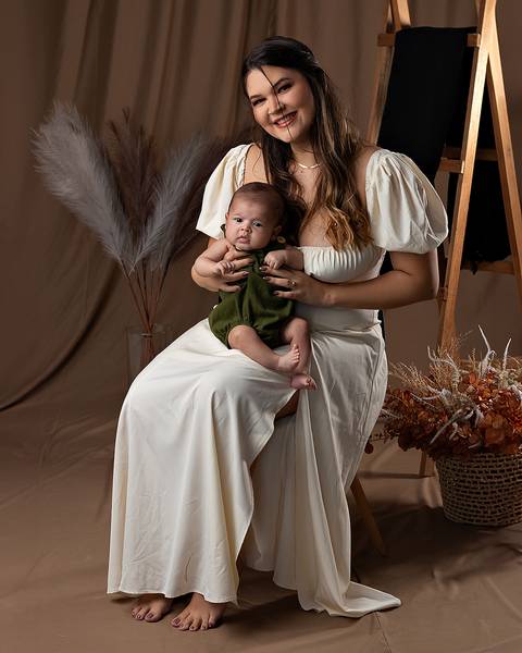 Ensaio de Disa das Mães de mãe e filho.'