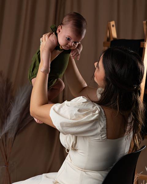Ensaio de Disa das Mães de mãe e filho.'