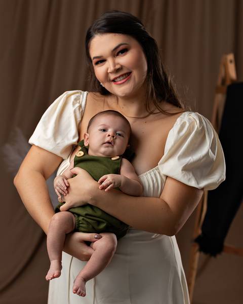 Ensaio de Disa das Mães de mãe e filho.'