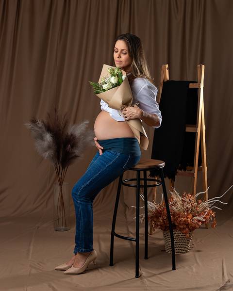 Ensaio de Dia das Mães com mãe e filhos pequenos.'