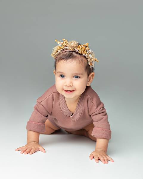 Ensaio de Acompanhamento de bebê em estúdio'