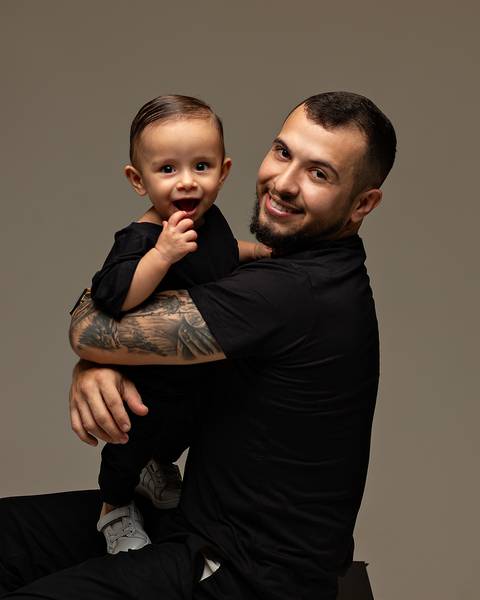 Ensaio de Dia dos Pais com bebê e família'