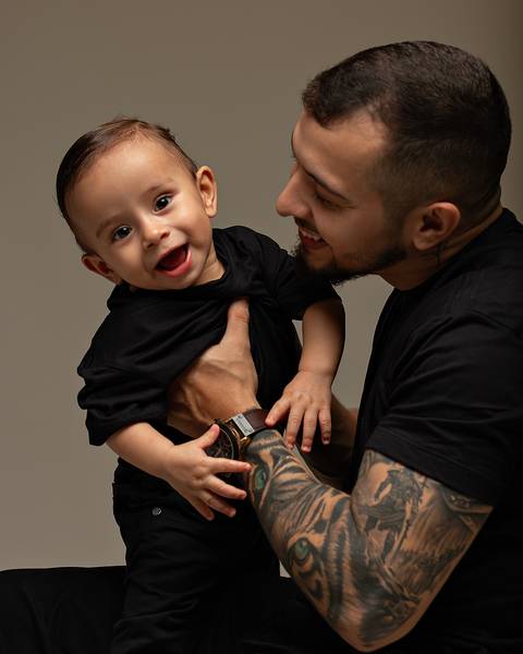 Ensaio de Dia dos Pais com bebê e família'