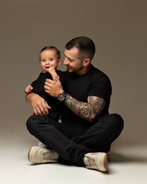 Ensaio de Dia dos Pais com bebê e família'