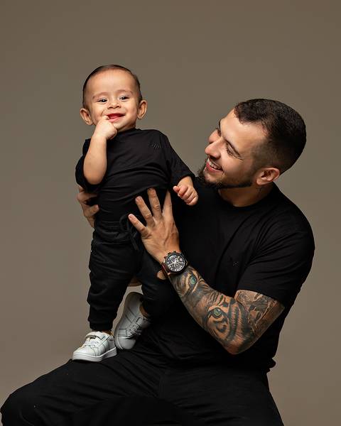 Ensaio de Dia dos Pais com bebê e família'