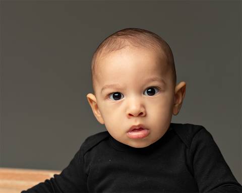 Sessão de Acompanhamento do bebê. Ensaio de Dia dos Pais com família e bebê'