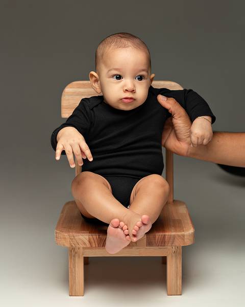 Sessão de Acompanhamento do bebê. Ensaio de Dia dos Pais com família e bebê'