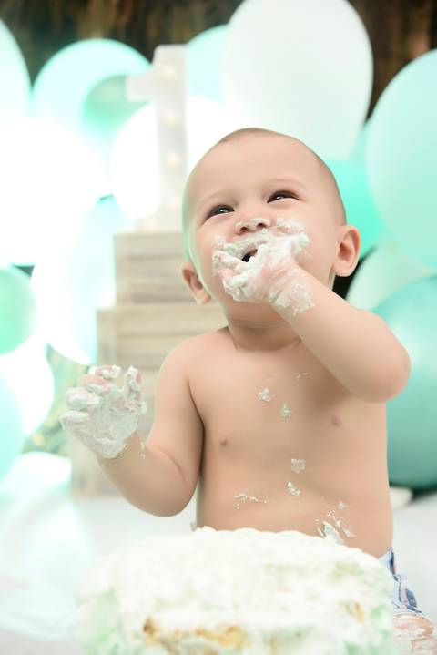 ensaio de um ano externo com bolo'