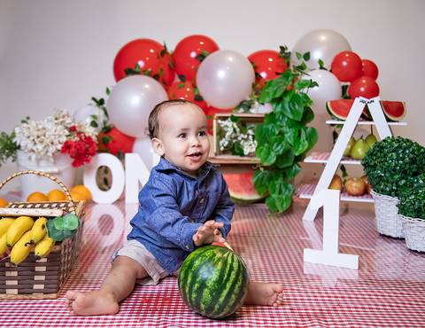 fotografia menino tema piquinique primeiro aniversario'