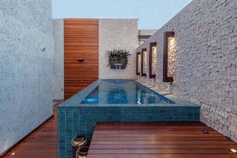 area privativa com psicna psicina com cascata piscina em apartamento diego rocha fotografo fotografia de arquitetura e ambiente bh belo horizonte'
